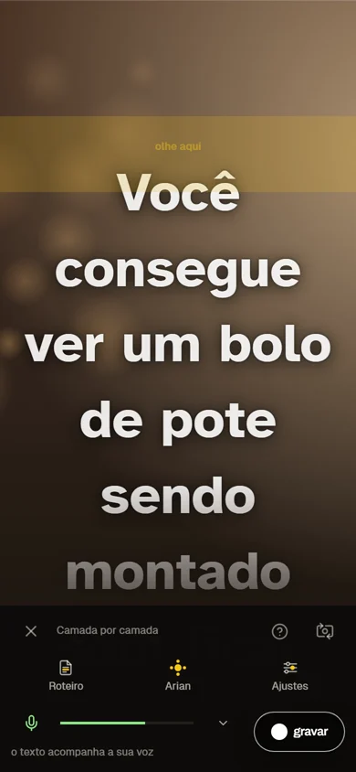 No Modo Gravar, a pessoa pede outras aberturas, a Arian escreve três, ela aplica uma com um toque e o texto na câmera muda.